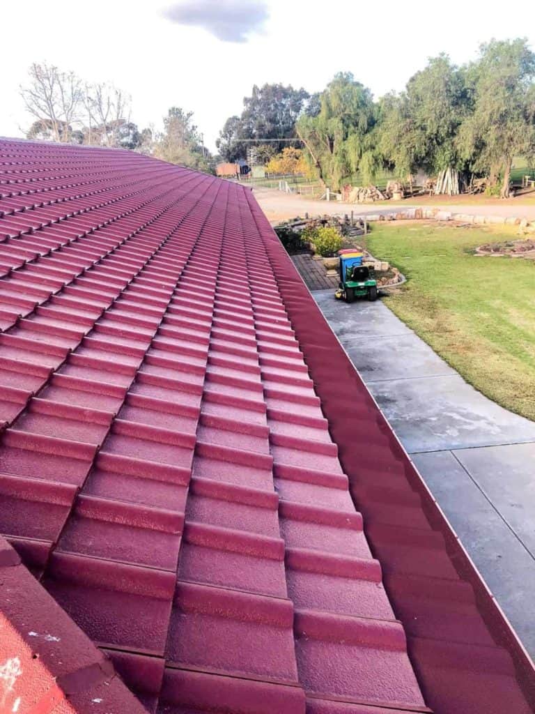 Manor red tile roof with gutter guard