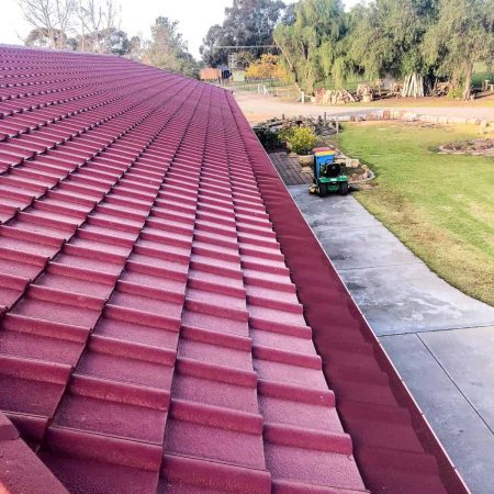 Manor red tile roof with gutter guard